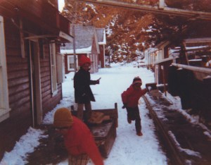 Squaw Harbor schoolkids playing on the boardwalk during recess